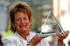 Alison holding the Secsavers Award